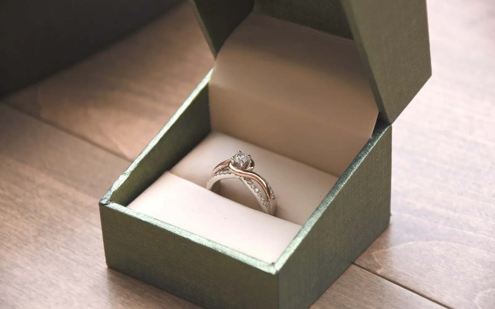 Diamond engagement ring in an open box